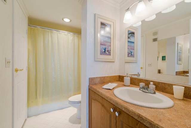 bathroom with vanity, tile floors, toilet, and ornamental molding