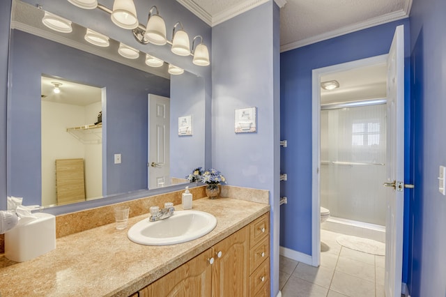 336 Golfview Rd Unit 1011, North Palm Beach, FL 33408 - bathroom with tile patterned flooring, a shower stall, vanity, toilet, and ornamental molding
