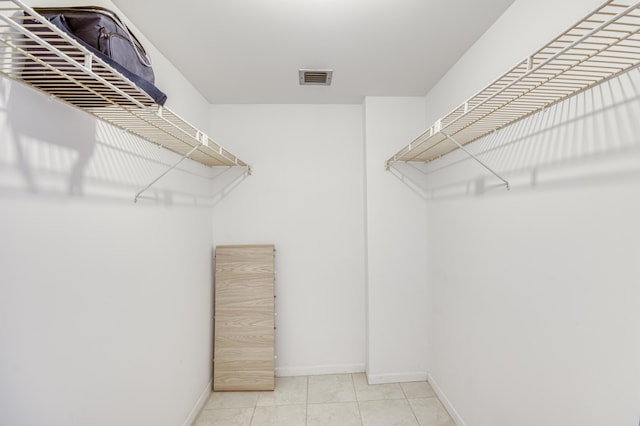 336 Golfview Rd Unit 1011, North Palm Beach, FL 33408 - spacious closet featuring tile patterned flooring
