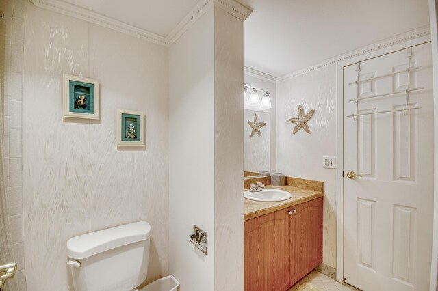 336 Golfview Rd Unit 1011, North Palm Beach, FL 33408 - bathroom with toilet, crown molding, vanity, and tile patterned flooring
