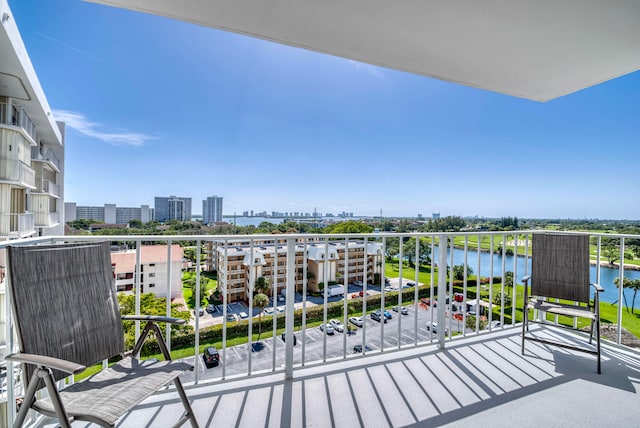 balcony featuring a water view