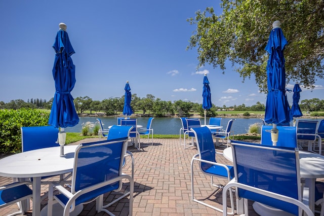336 Golfview Rd Unit 1011, North Palm Beach, FL 33408 - view of patio / terrace featuring outdoor dining space and a water view