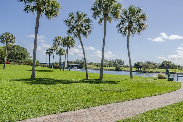 336 Golfview Rd Unit 1011, North Palm Beach, FL 33408 - view of community with a water view and a yard