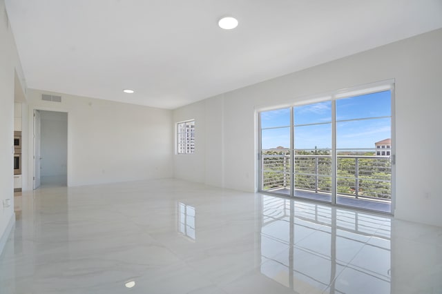 view of tiled spare room