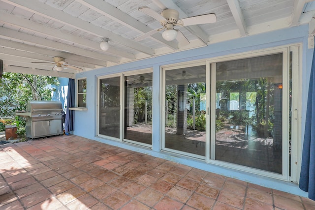 view of patio / terrace with area for grilling and ceiling fan