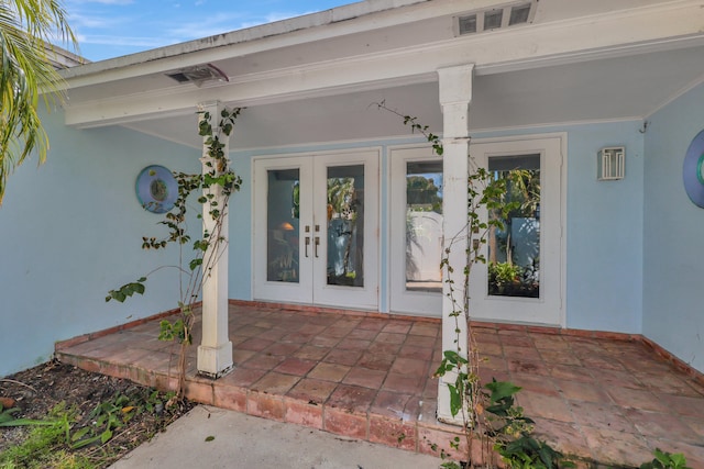 view of exterior entry with french doors