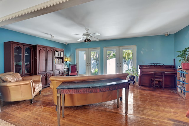 interior space featuring french doors, hardwood / wood-style floors, and ceiling fan