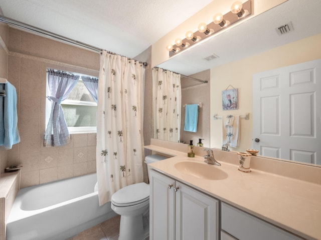 full bathroom with toilet, vanity with extensive cabinet space, shower / tub combo with curtain, tile flooring, and a textured ceiling