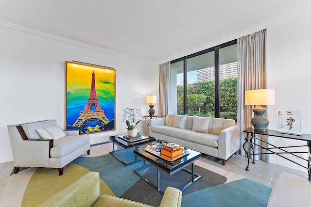 living room featuring ornamental molding, light tile patterned floors, and a wall of windows