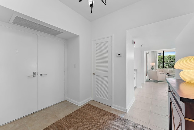 interior space featuring light tile patterned floors