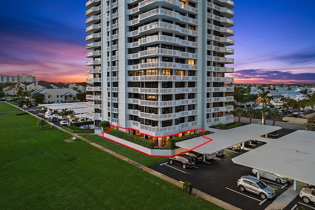 view of outdoor building at dusk