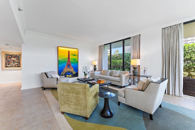 living room with light tile patterned floors, ornamental molding, and a healthy amount of sunlight