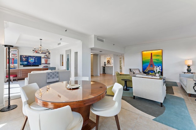 dining area featuring light tile patterned flooring