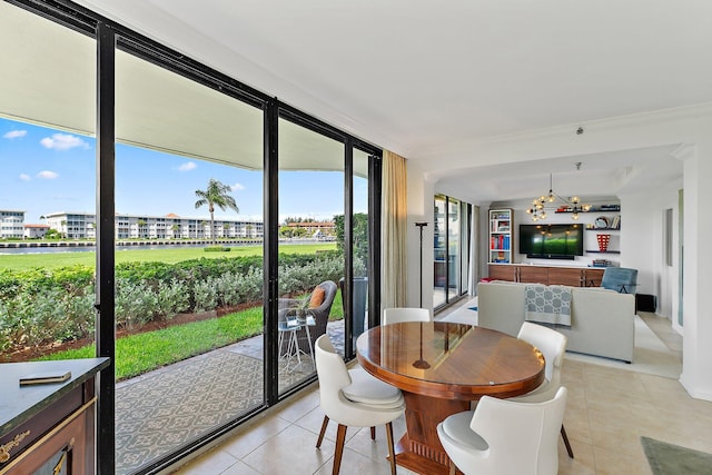 tiled dining room with a wall of windows