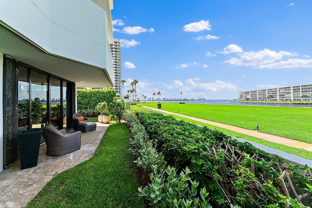 view of yard with a water view