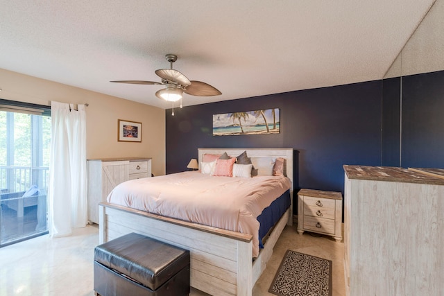 bedroom featuring a textured ceiling, ceiling fan, and light tile flooring