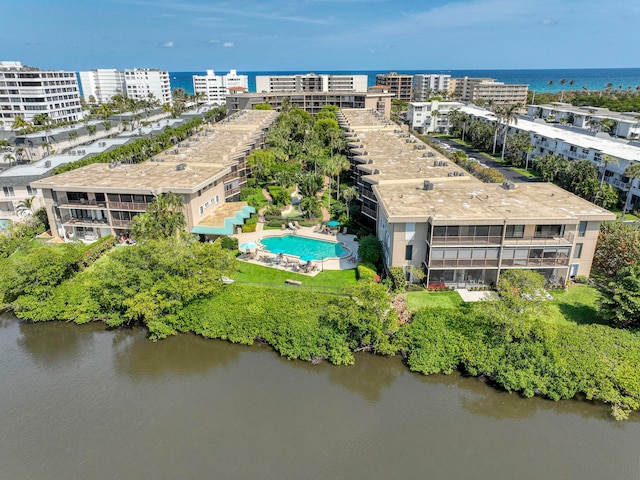 birds eye view of property featuring a water view