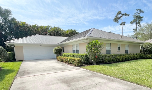 single story home with a front lawn and a garage