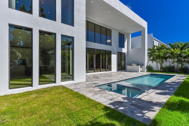 exterior space with a yard and a patio