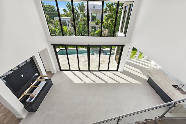 living room with a towering ceiling