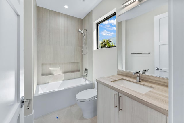 full bathroom with toilet, tile floors, large vanity, and shower / bath combination