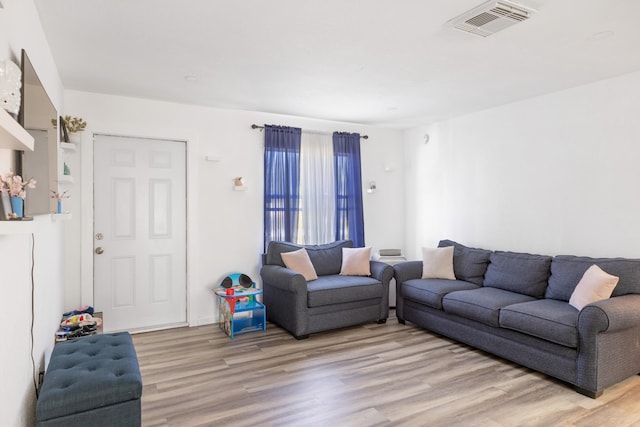 living room featuring light wood-type flooring