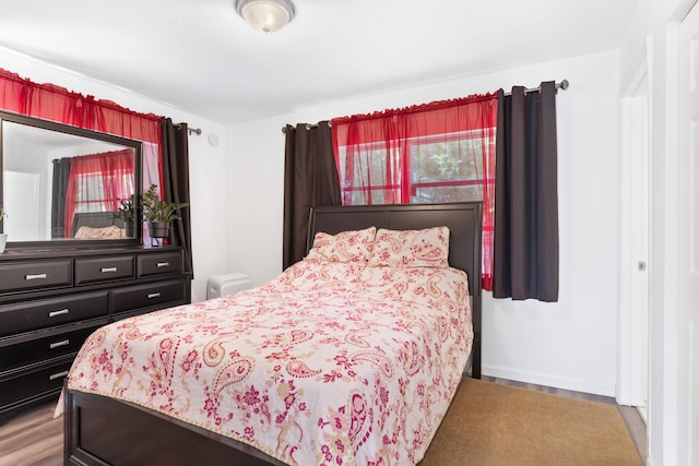 bedroom with light wood-type flooring