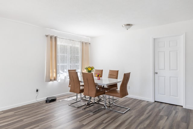 dining room with dark wood-type flooring