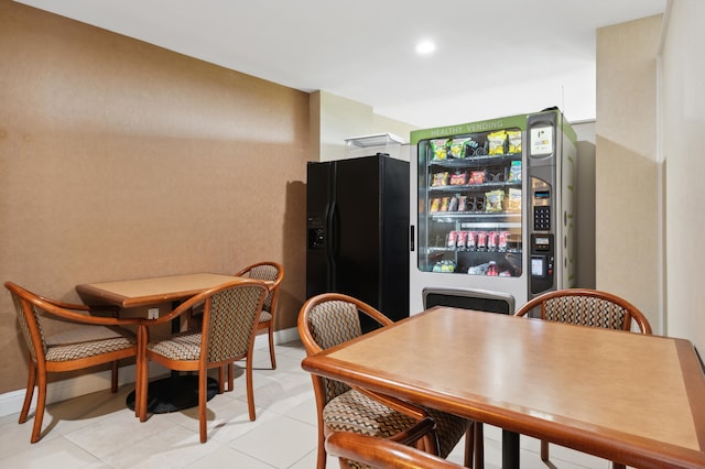 dining room with light tile flooring