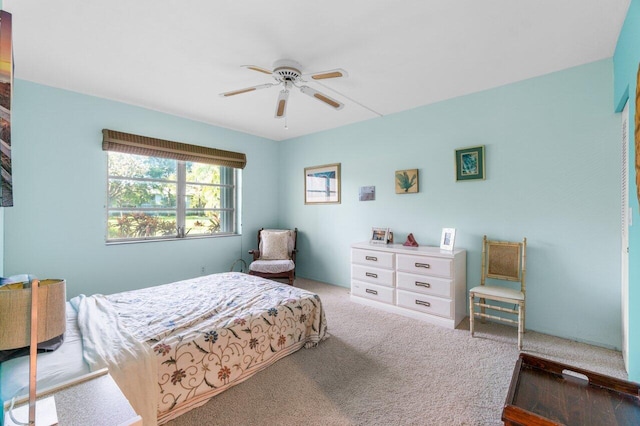 bedroom featuring ceiling fan and light colored carpet