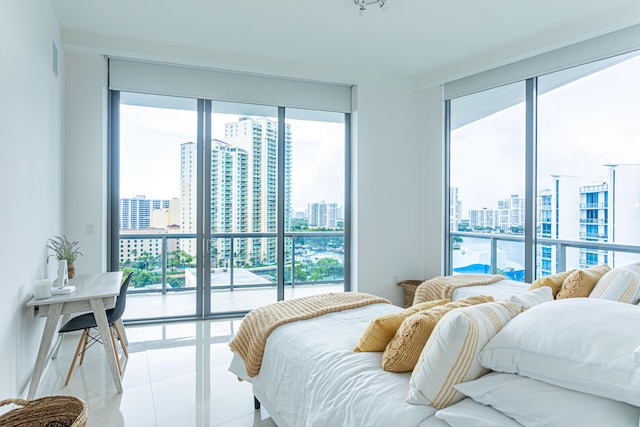 bedroom featuring a city view and tile patterned flooring