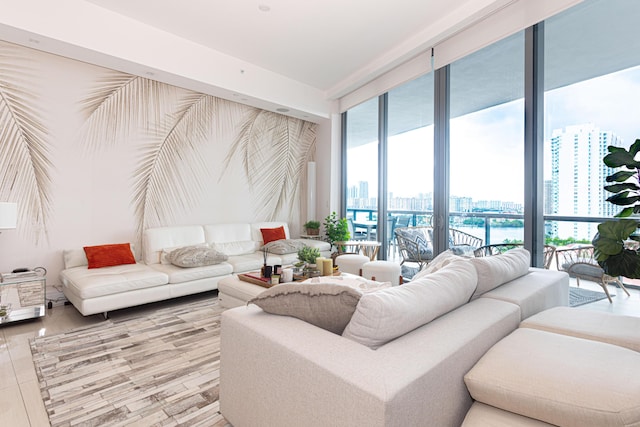 living area featuring a city view and a water view