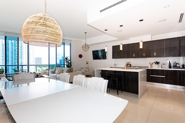 dining space featuring light tile patterned floors