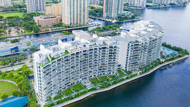 view of urban area featuring a large body of water