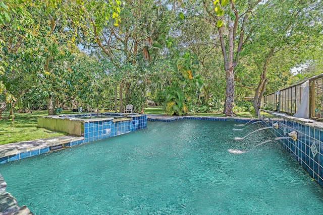 view of swimming pool featuring pool water feature