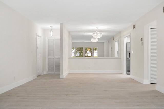 empty room featuring light hardwood / wood-style floors