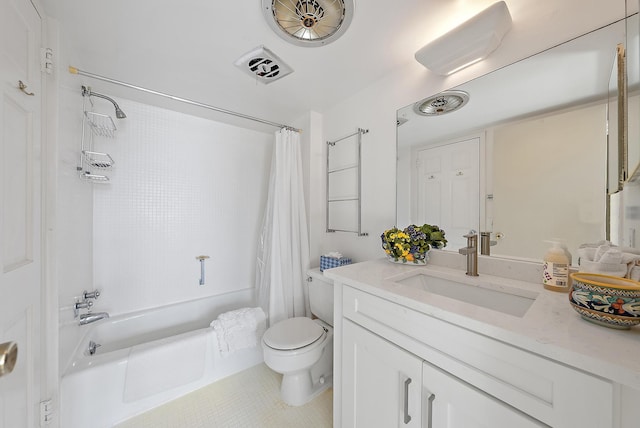 full bathroom with tile patterned flooring, vanity, toilet, and shower / bath combo with shower curtain