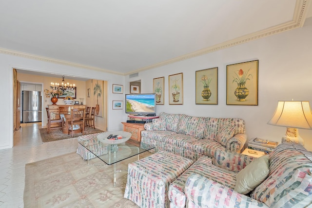 living room with a chandelier and ornamental molding