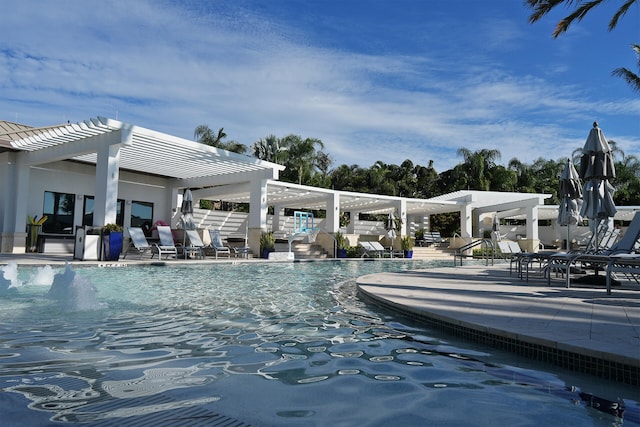 view of swimming pool featuring a pergola and a patio area