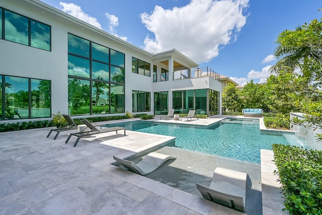 view of swimming pool featuring a patio