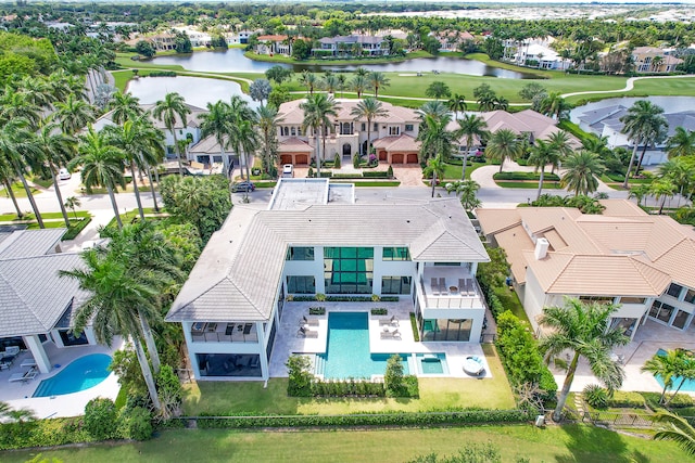 drone / aerial view with a water view