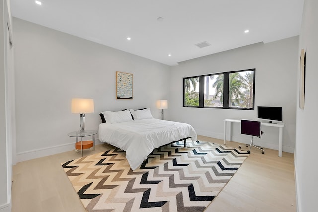 bedroom featuring light hardwood / wood-style flooring