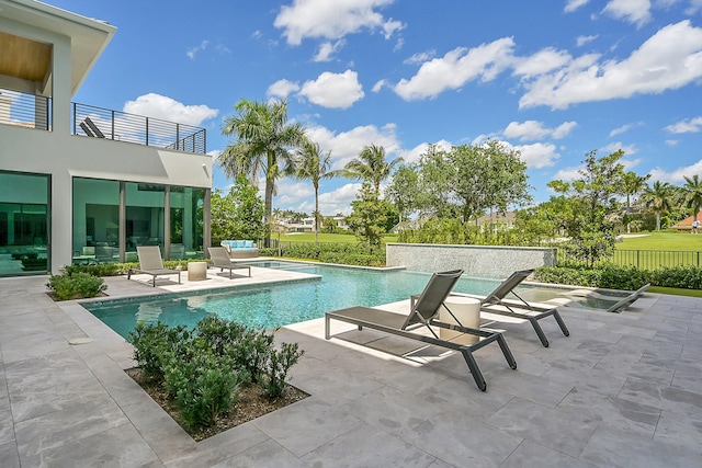 view of pool with a patio