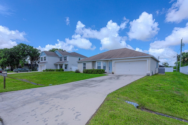 view of front of house featuring a garage and a front yard