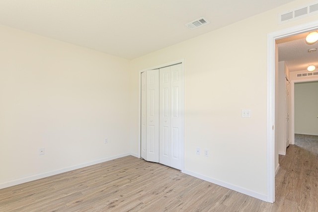 empty room featuring light hardwood / wood-style flooring