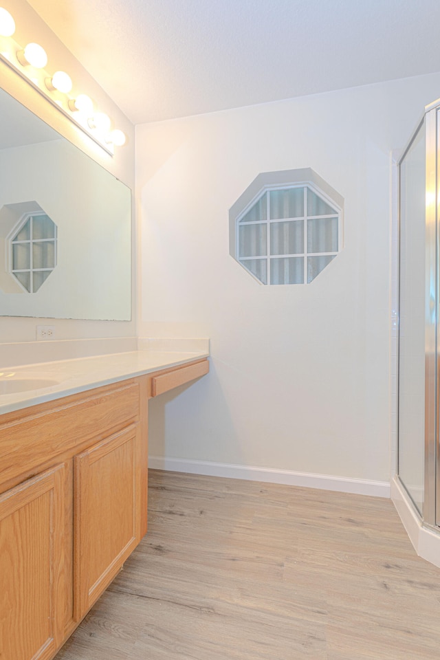 walk in closet featuring light hardwood / wood-style floors