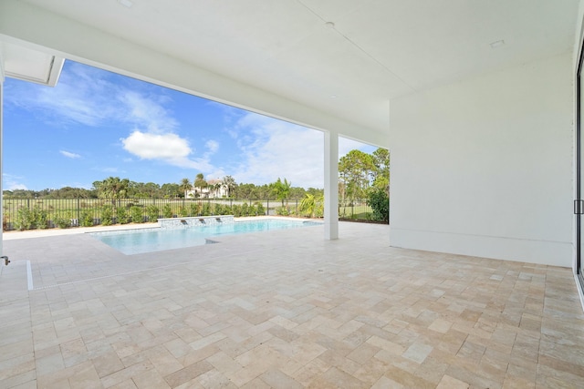 view of pool featuring a patio area and pool water feature