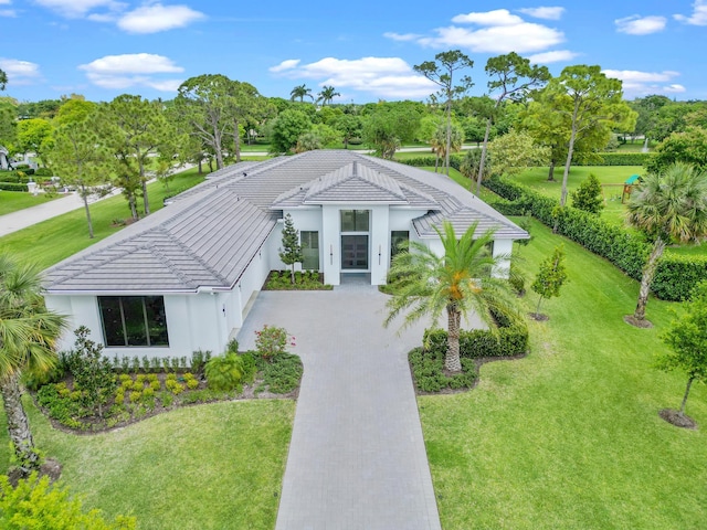 exterior space with a front lawn