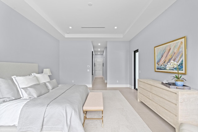 bedroom featuring a tray ceiling