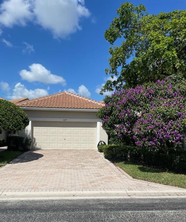 view of front of house with a garage